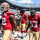 Colin Kaepernick, No. 7 of the San Francisco 49ers, walks to the locker room prior to their game against the Carolina Panthers at Bank of America Stadium in Charlotte, N.C., on Sept. 18, 2016. (Streeter Lecka/Getty Images)